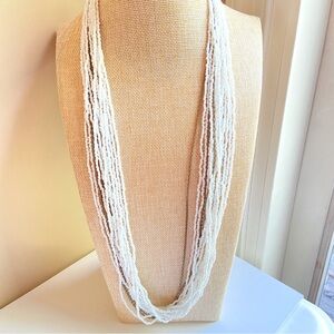 Long white glass seed bead necklace multistrand with three metal accent chains